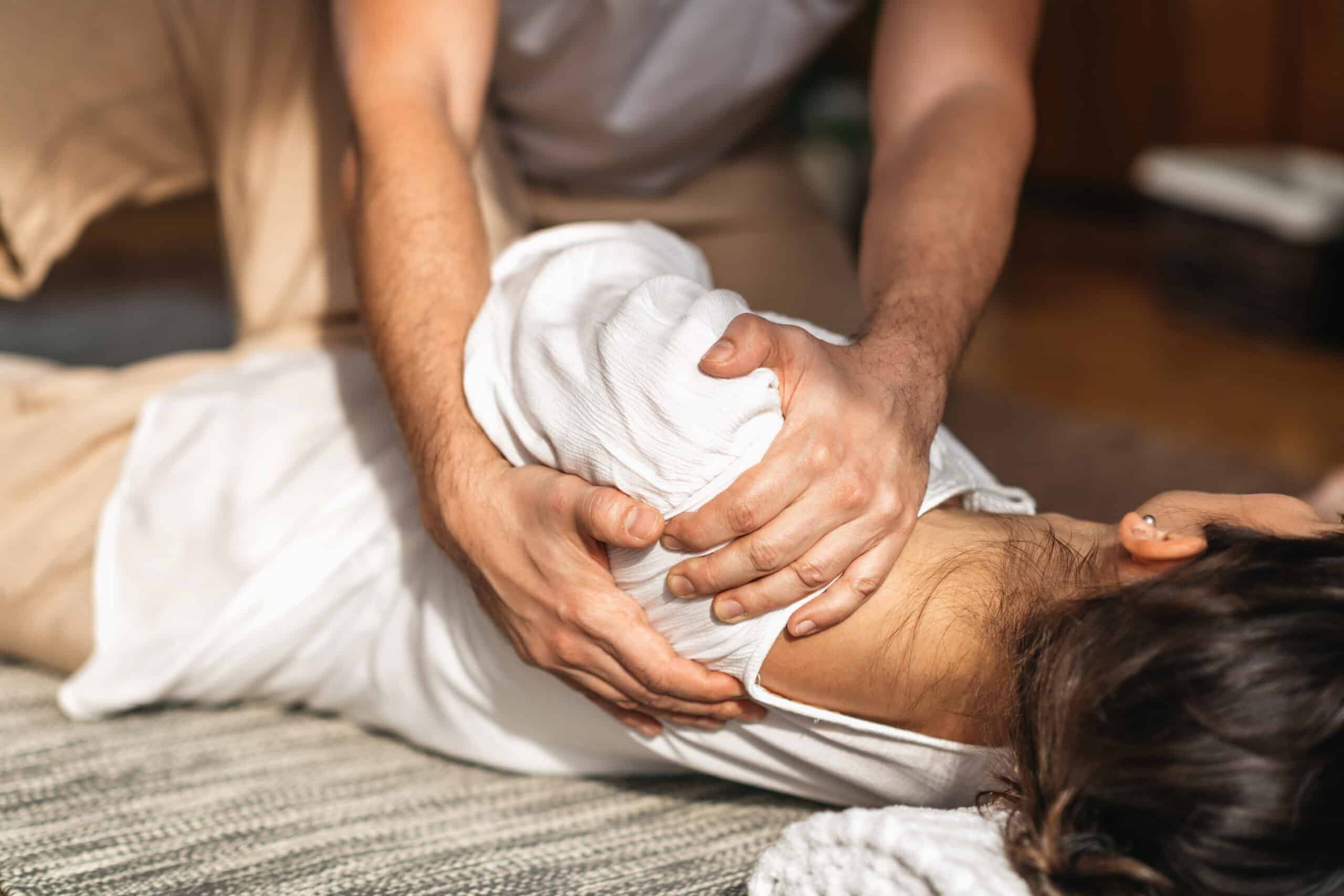 traditional thai massage frozen shoulder treatment